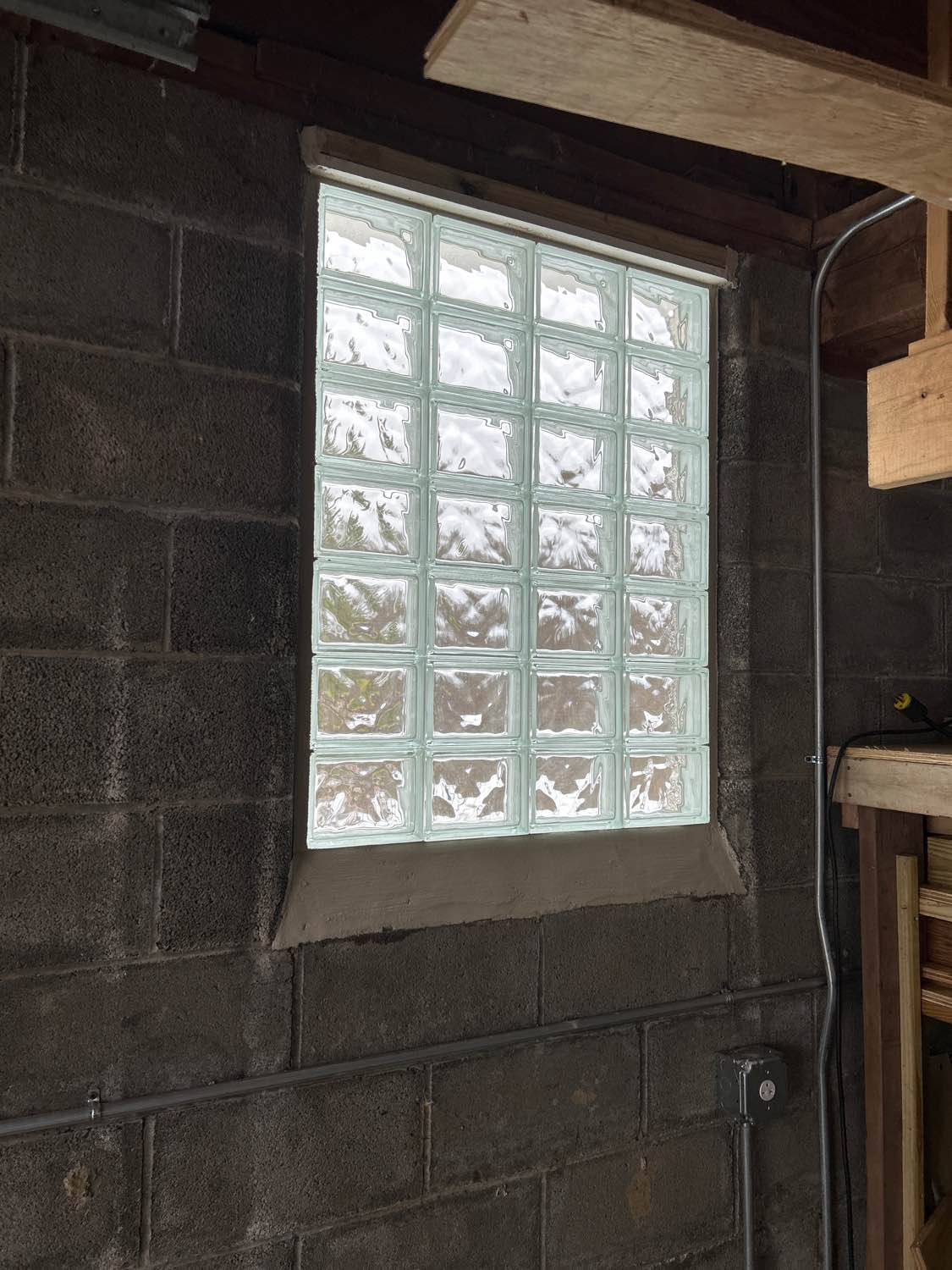 Egress window interior — natural light flooding basement