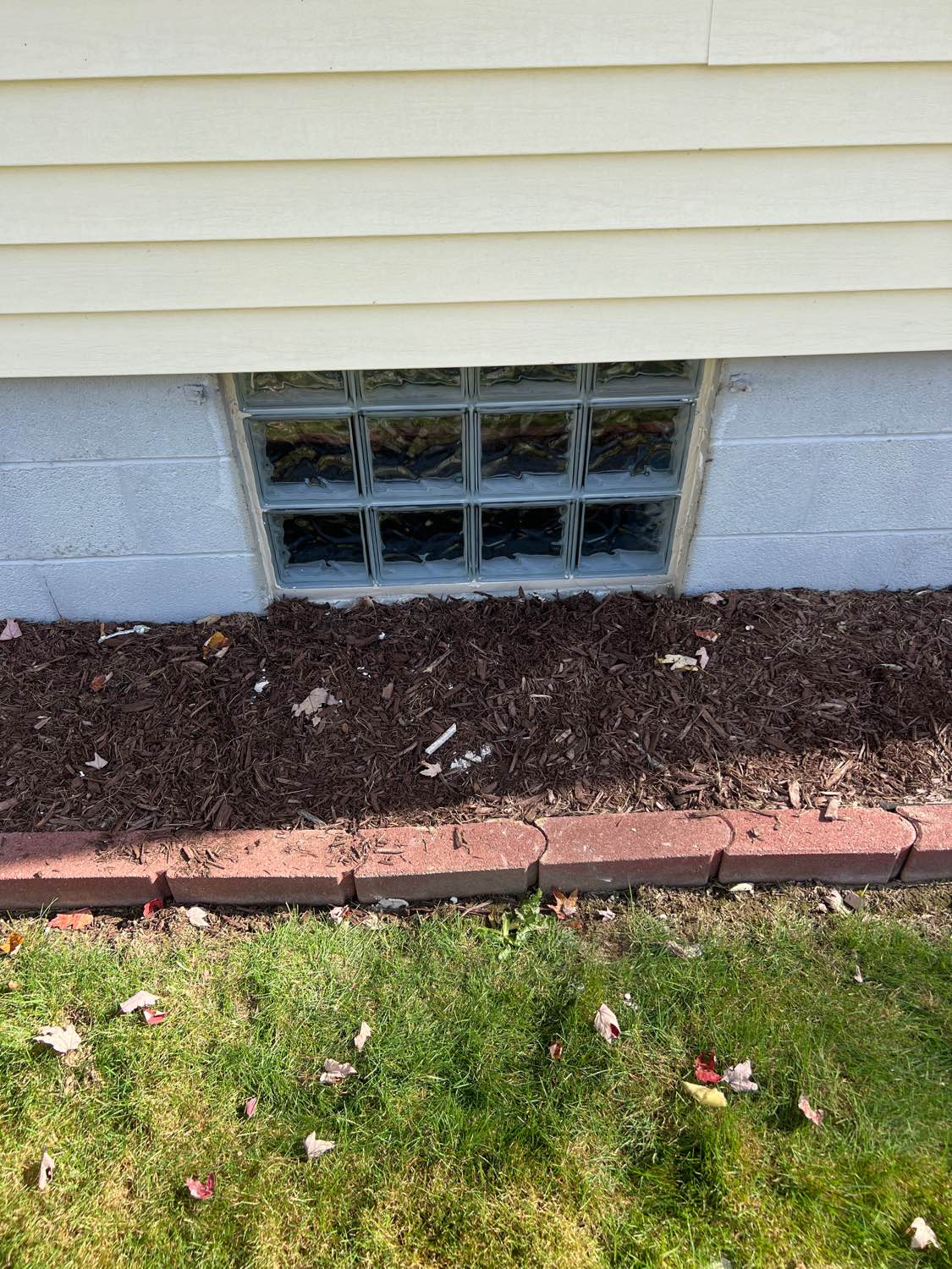 Egress window installation — foundation cutting in progress
